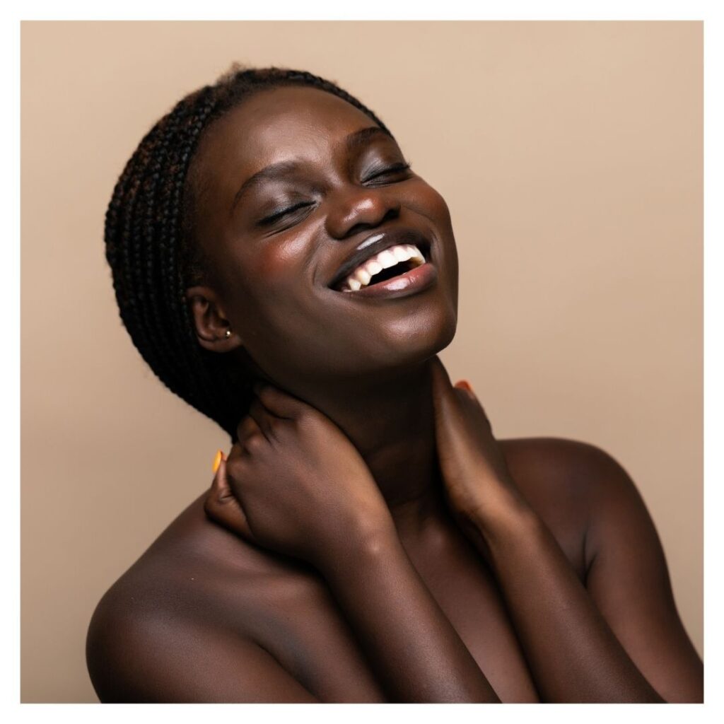 DArker skin tones - woman of color smiling