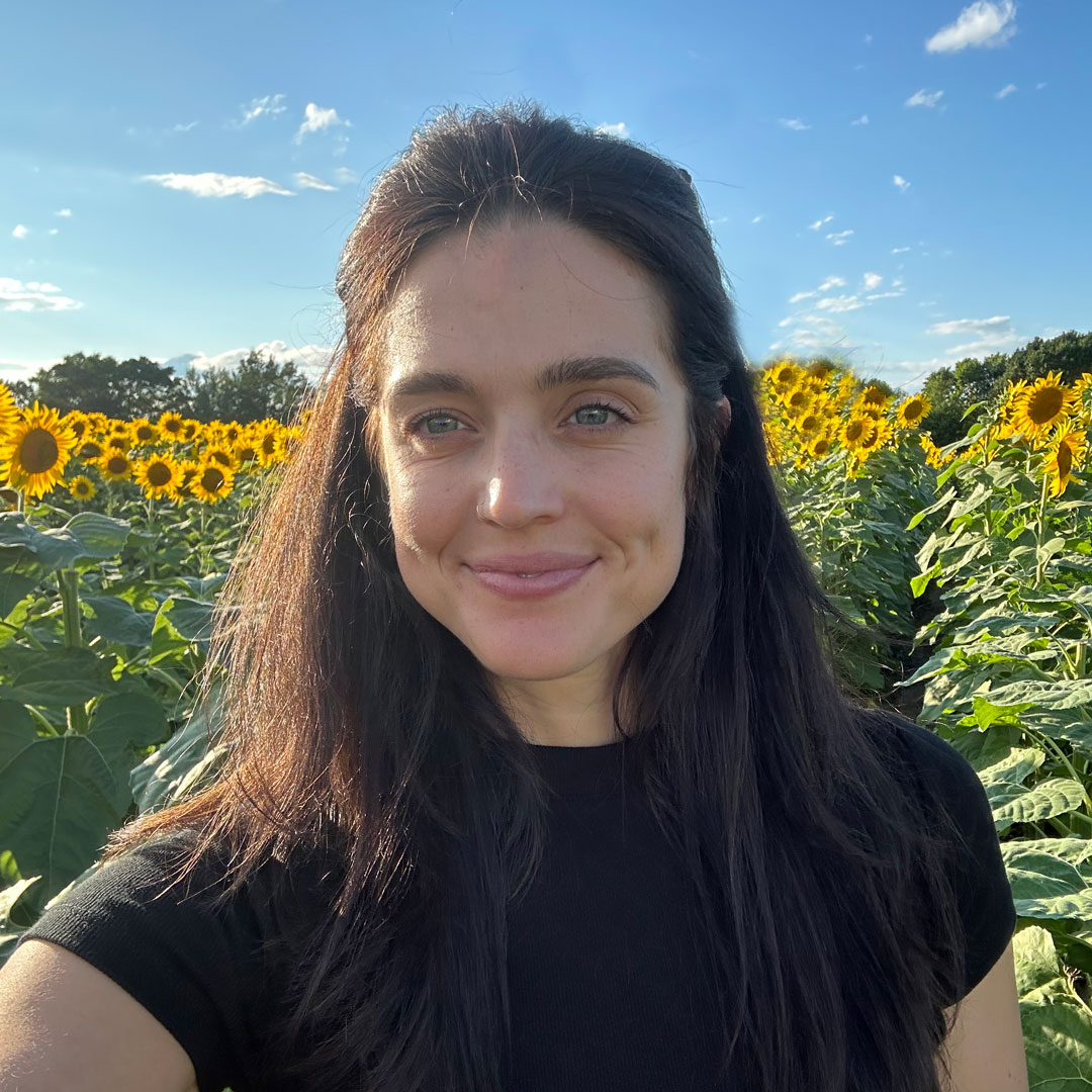 Zoe Nikitas PA-C field of sunflowers