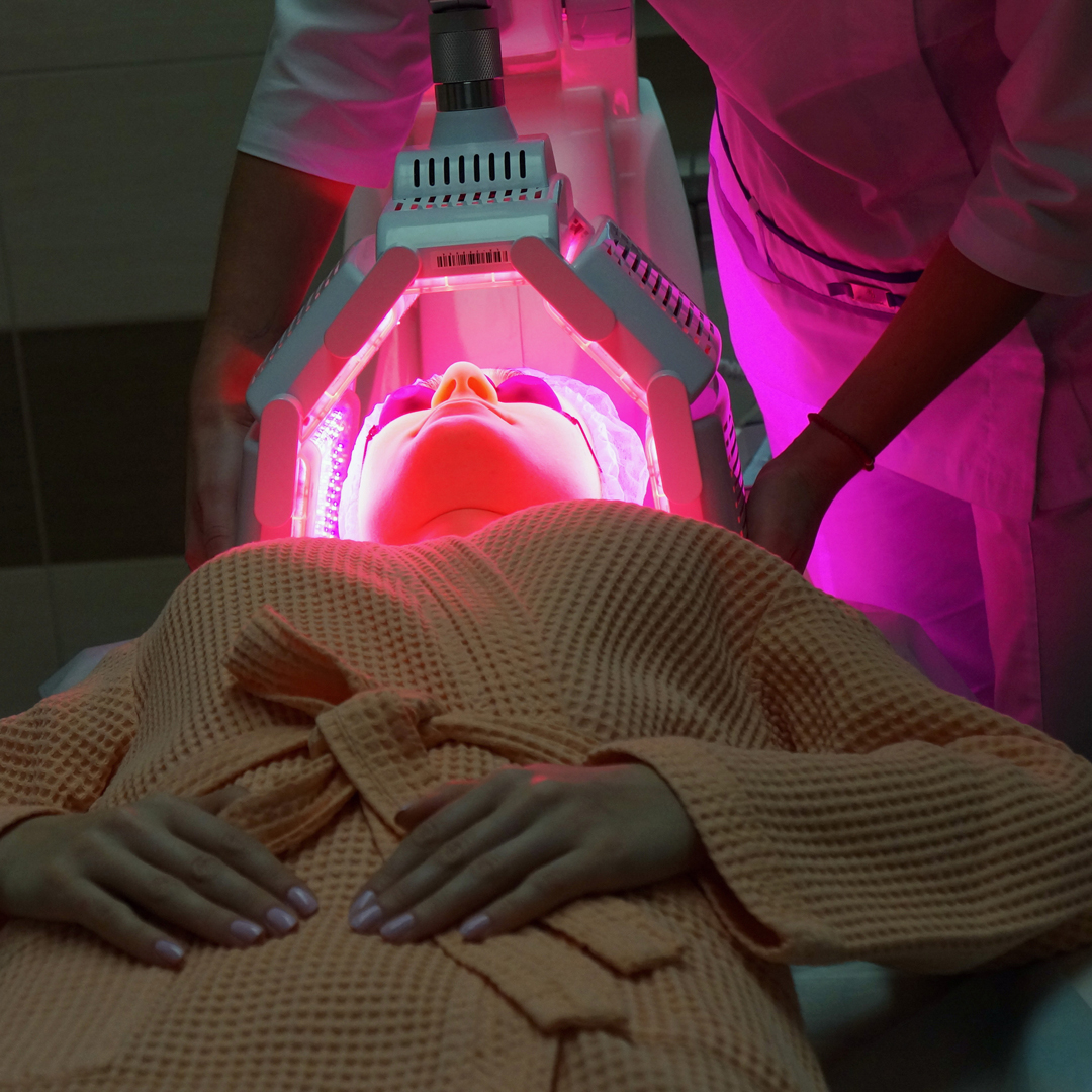 Photodynamic Therapy vs. Traditional Treatments: Which Is Right for You? Woman receiving PDT treatment
