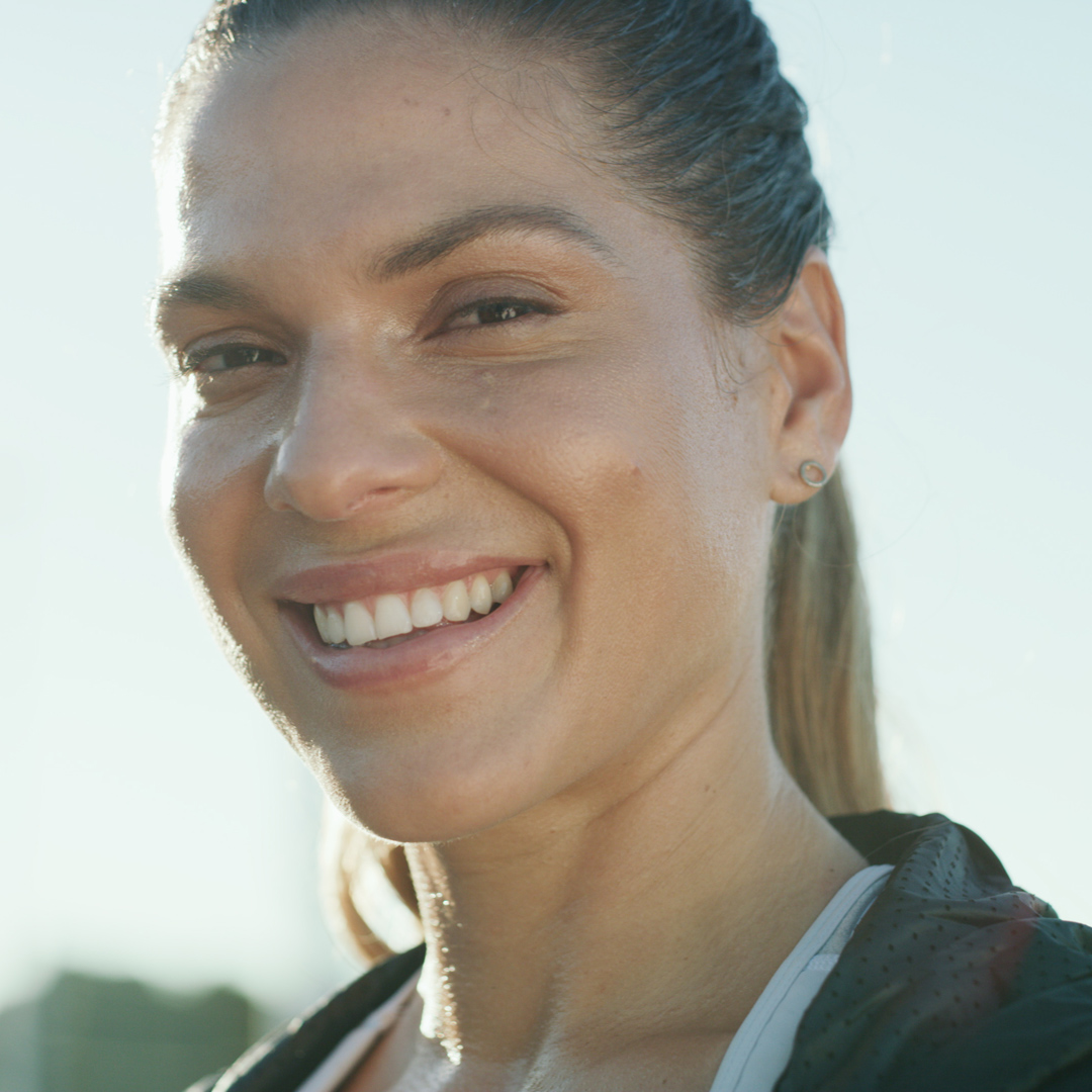 Everything you need to know about dermal fillers - smiling woman with natural look from filler. Dr. Koger and Dr. Fix offer filler as another specialty