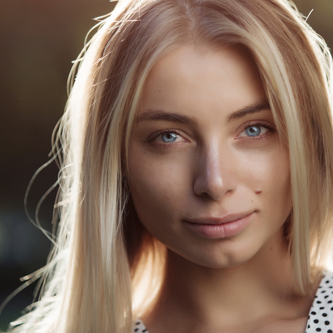 Fresh Face of woman who uses Revision skincare products